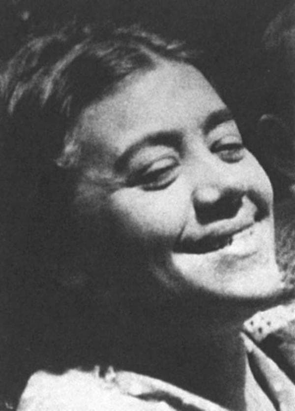Portrait of Celia Dropkin, smiling, in black and white